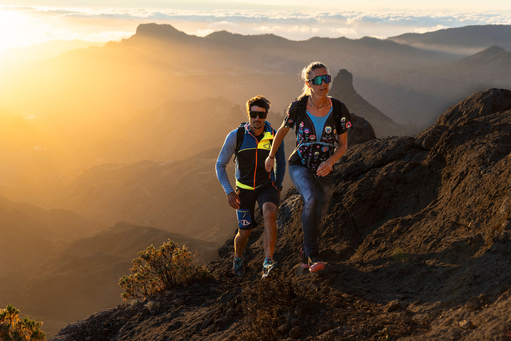 man and woman wearing crazy mountainwear