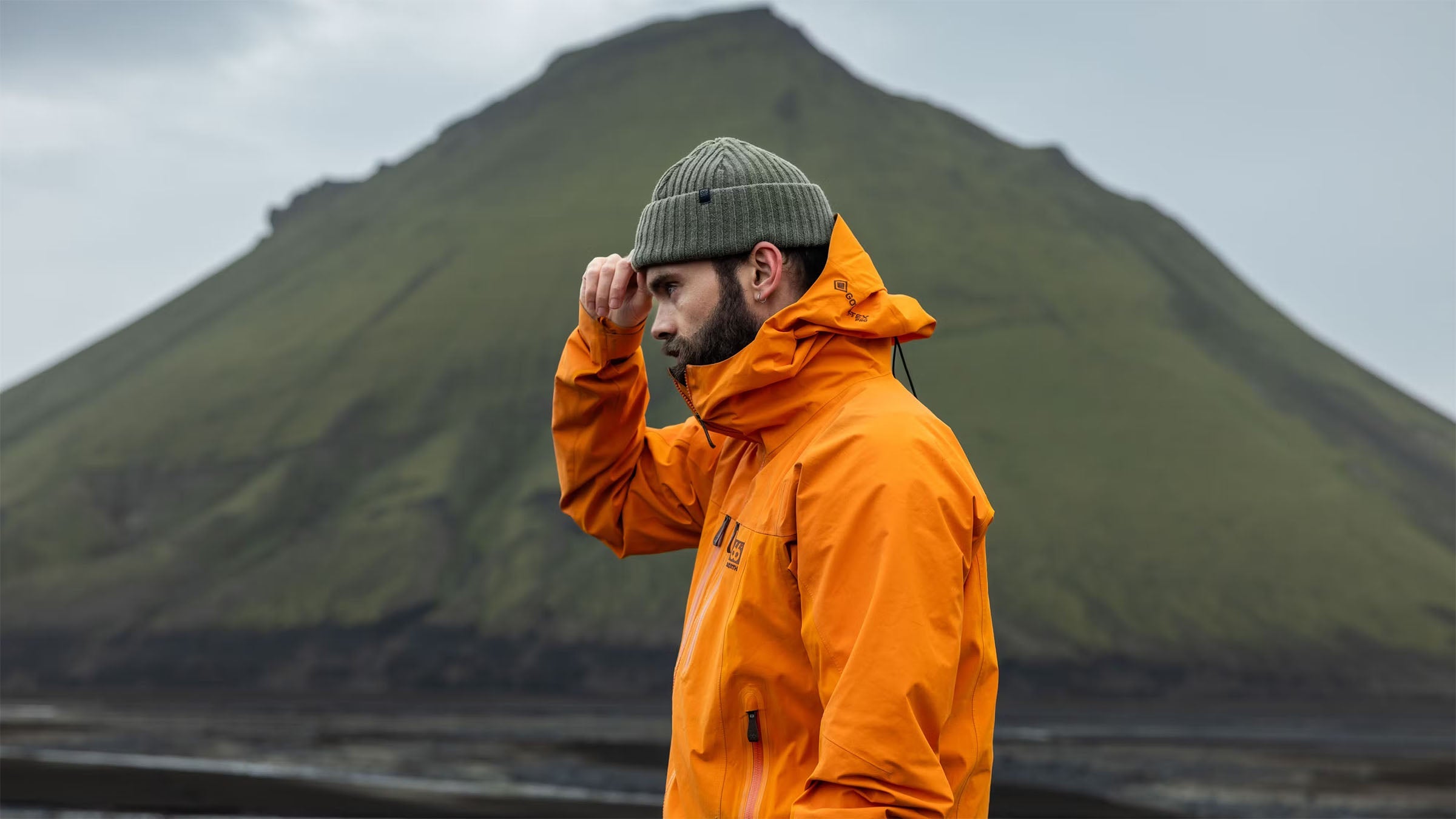 man wearing 66 north beanie and jacket