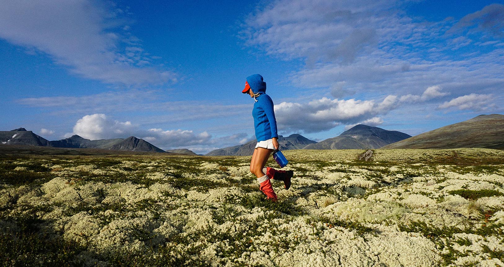 woman hiking in a scandinavian sweater by amundsen sports