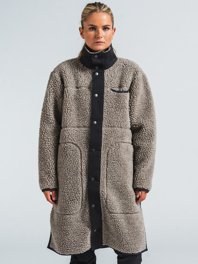 woman wearing varg koster long wool coat