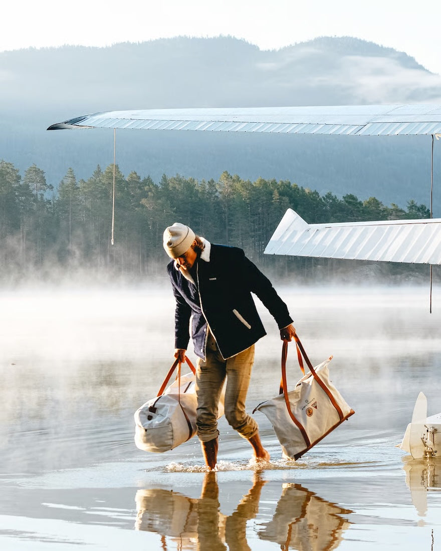 man traveling in amundsen harvester overshirt