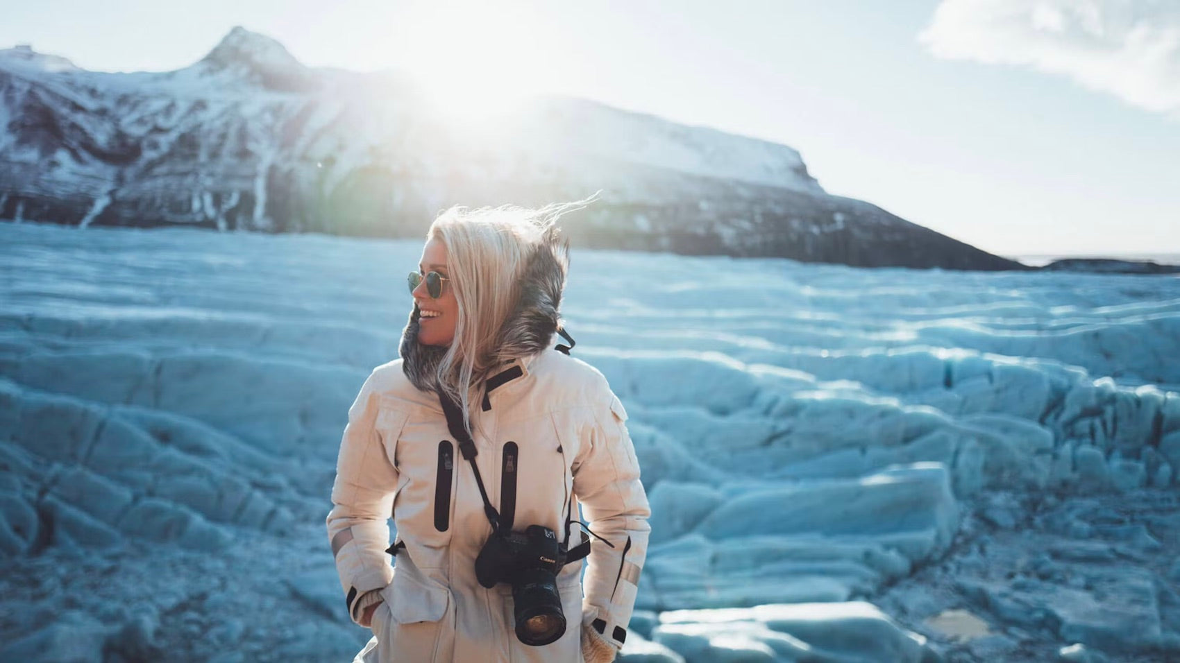 woman wearing a 66 north jacket, icelandic outerwear available at aktiv