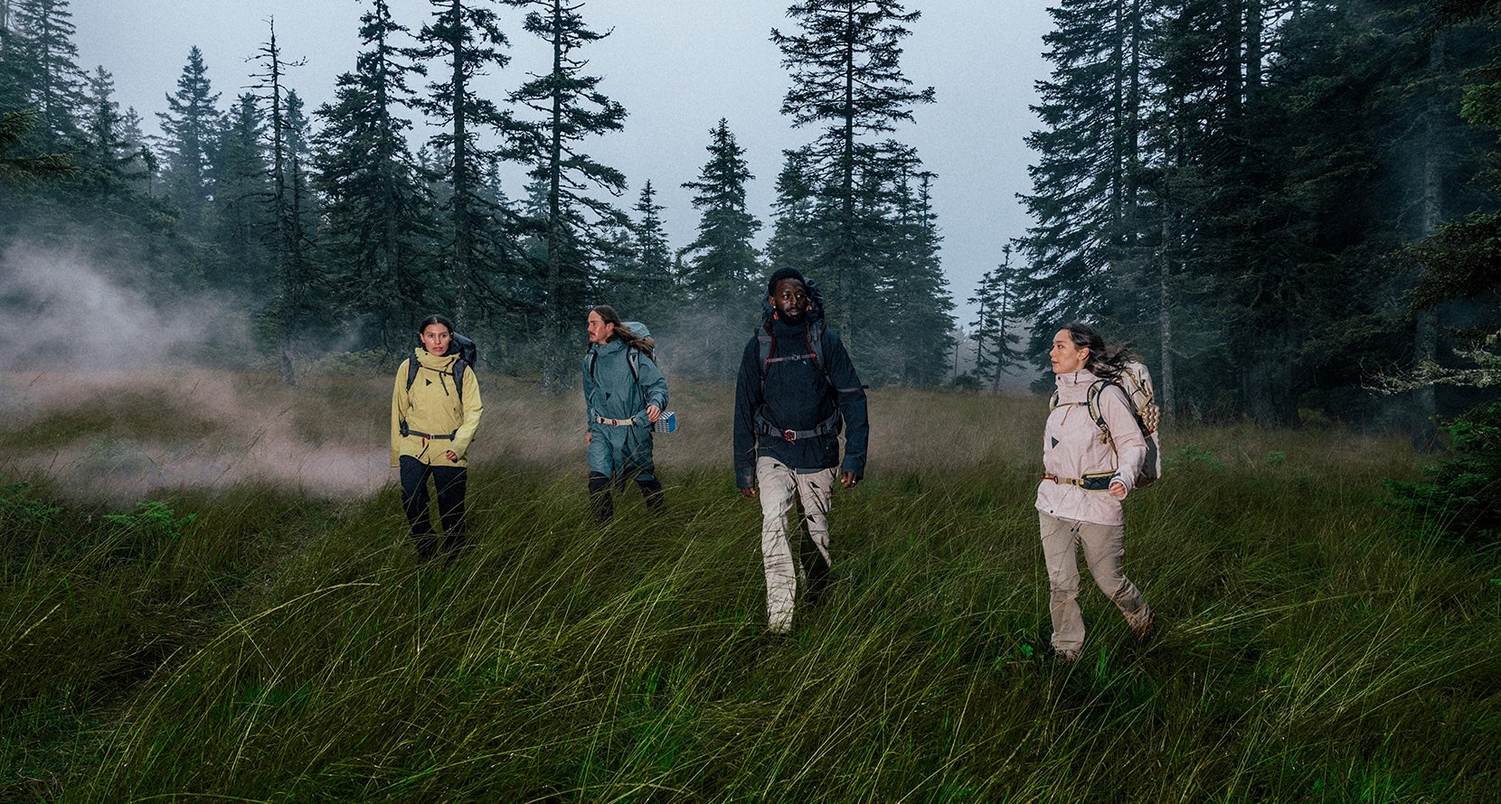 mountain climber wearing klattermusen mountaineering equipment