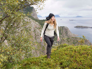 woman hiking in organic wool and silk shirt by northern playground for aktiv outdoor wear