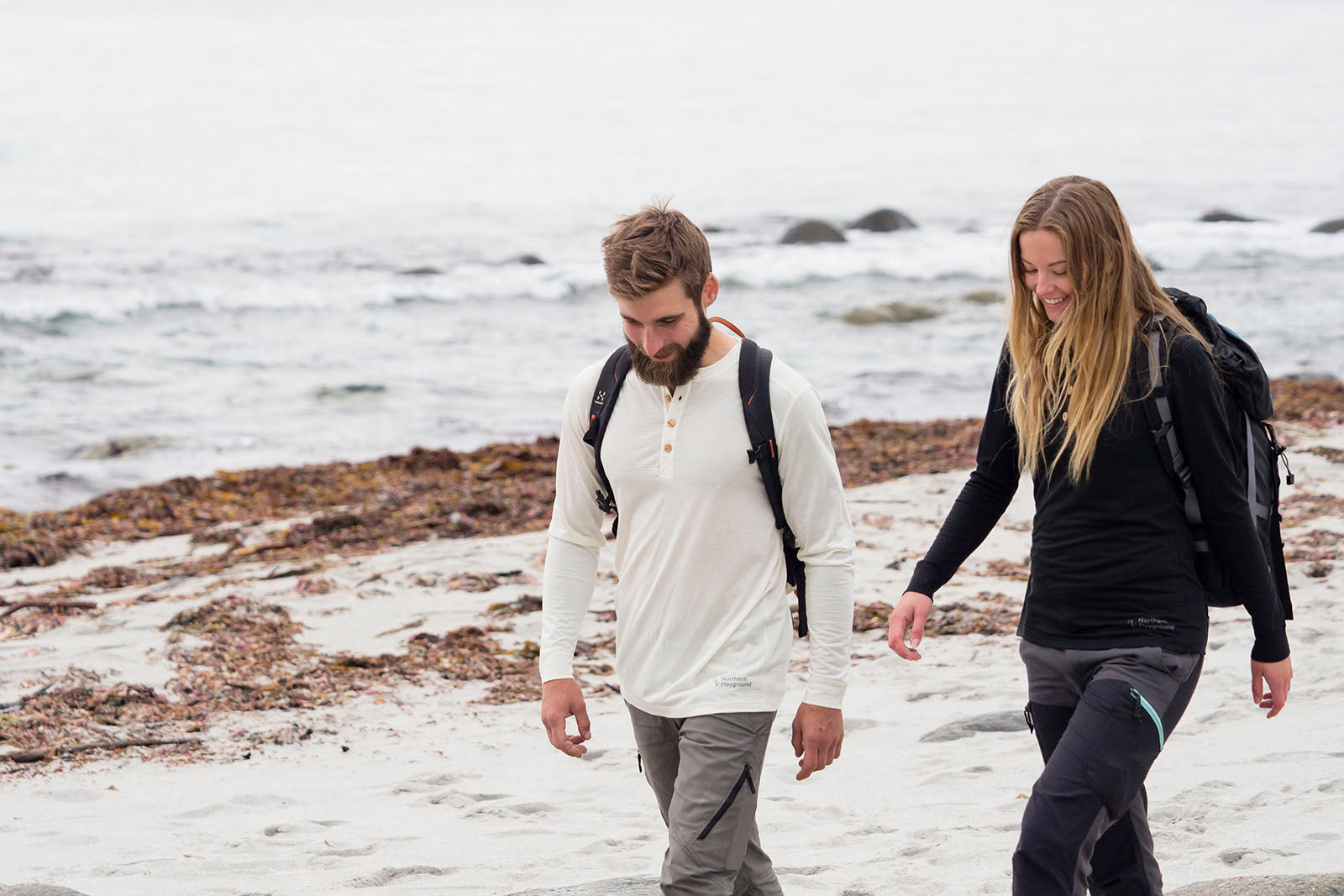 couple on the beach in northern playground walking clothes