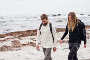 couple walking in organic wool and silk longsleeve shirts by northern playground for aktiv scandinavian clothing