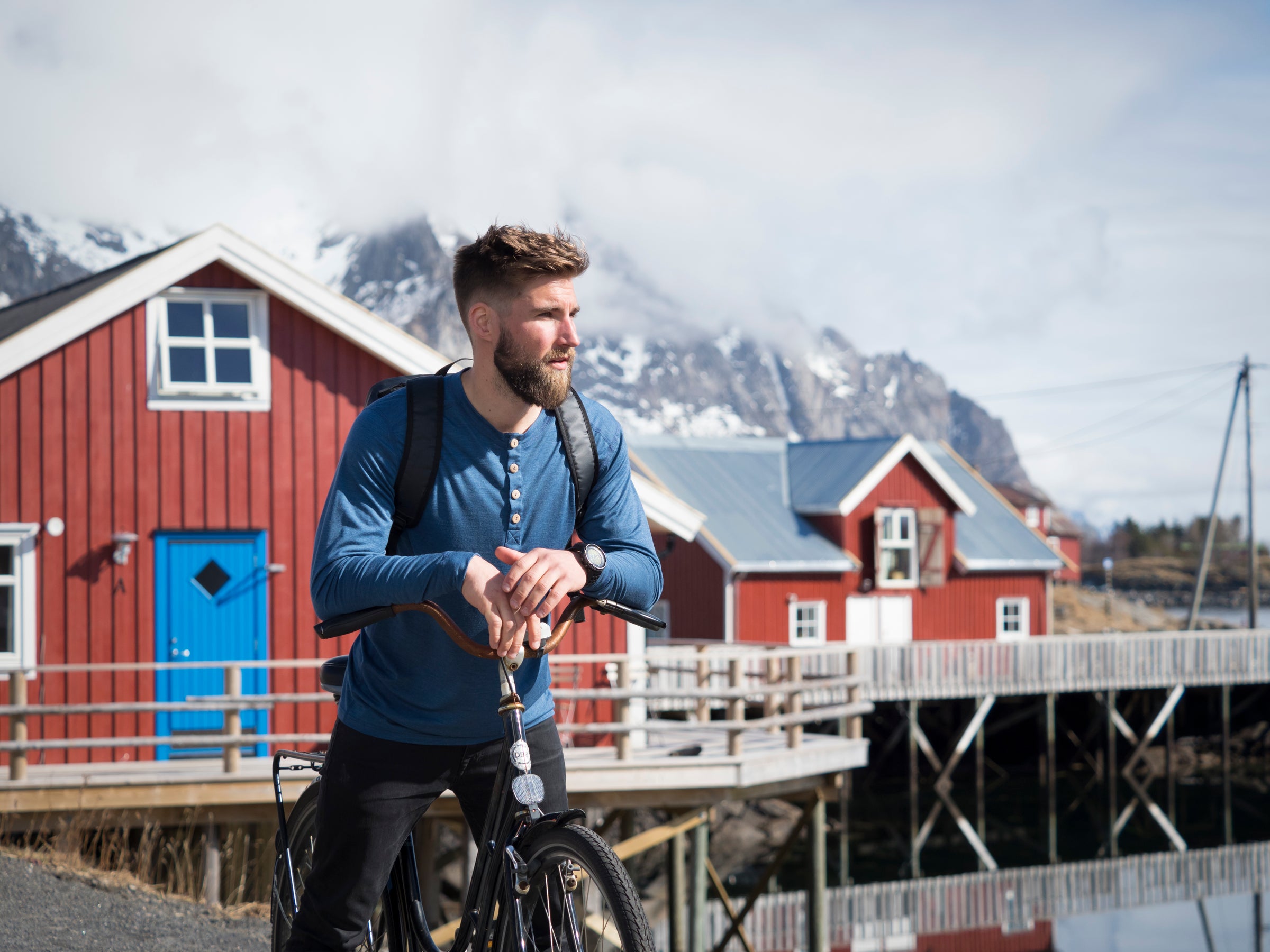man riding a bike in northern playground outdoor clothing