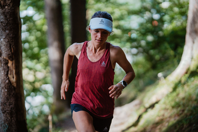 woman trail running in odlo sportswear
