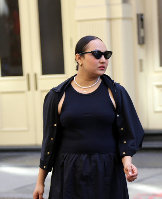 woman wearing elke nyc travel shrug