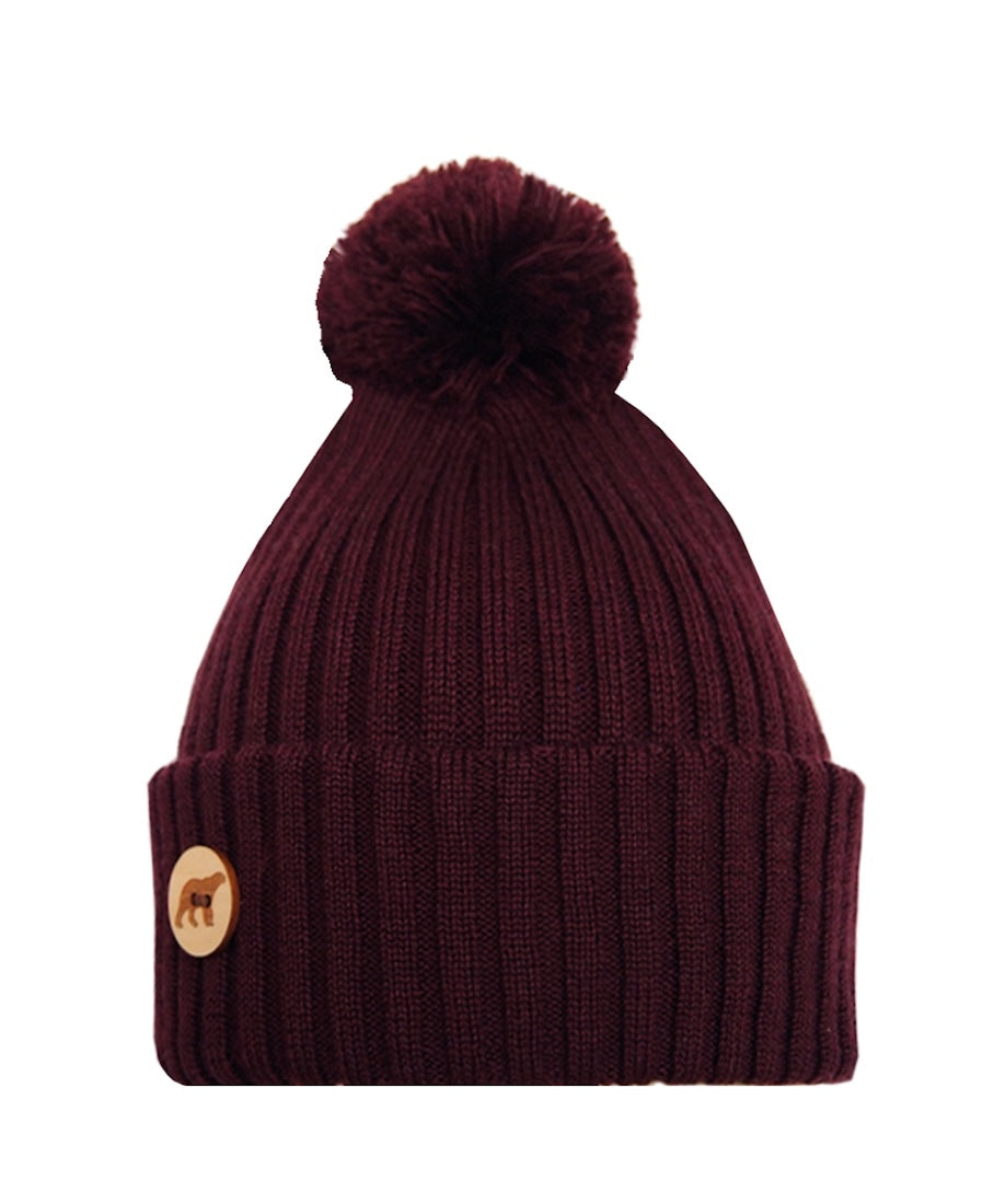 superyellow arctos pompom beanie in deep red