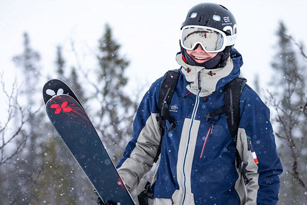 skiier wearing an elevenate ski jacket shell