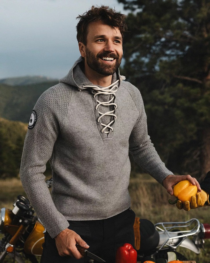 man wearing an amundsen boiled hoodie laced mens outdoors