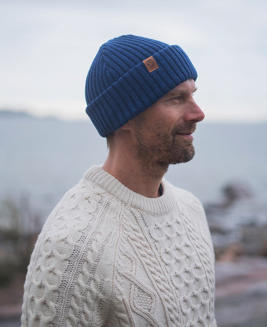 man wearing a superyellow sailor beanie in denim blue
