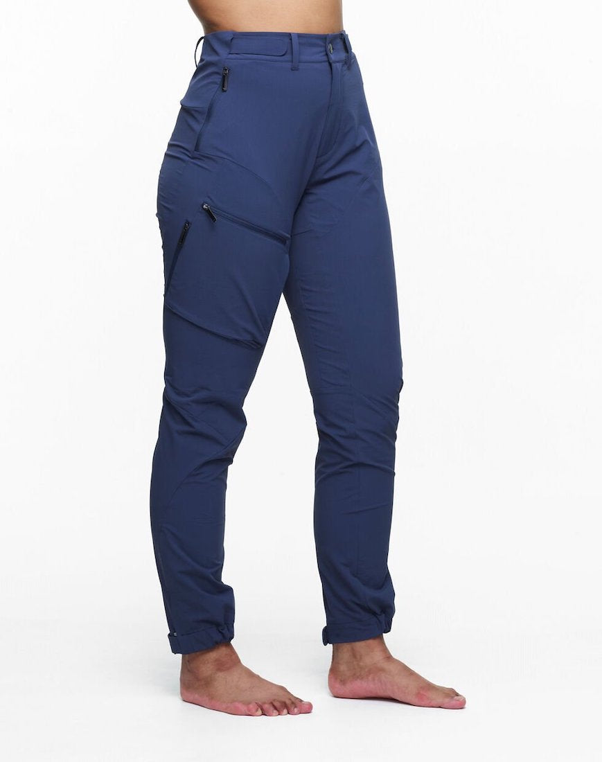 Front/side view of model wearing Voss pants in navy.