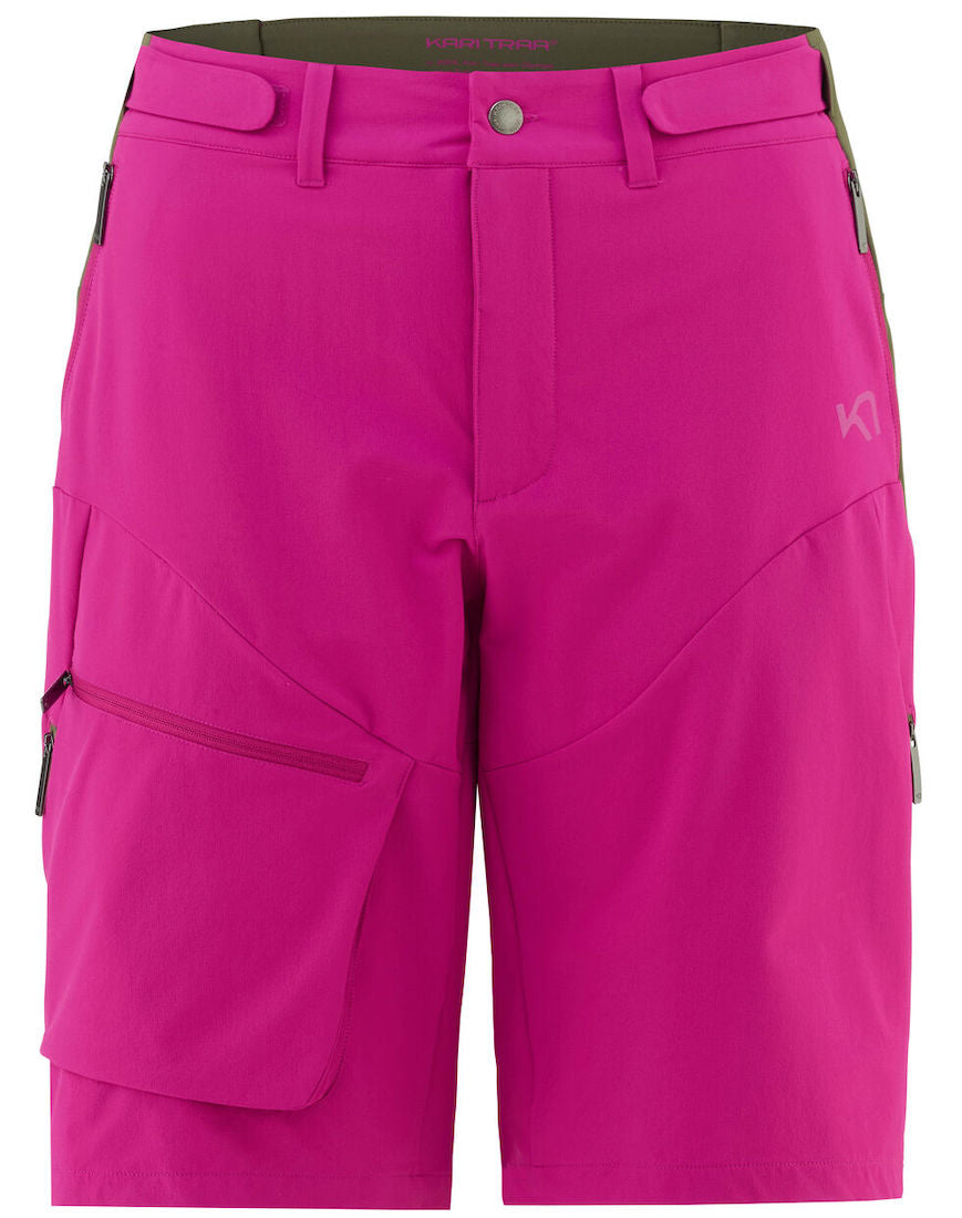 Front view of color block hiking shorts in pink and green.