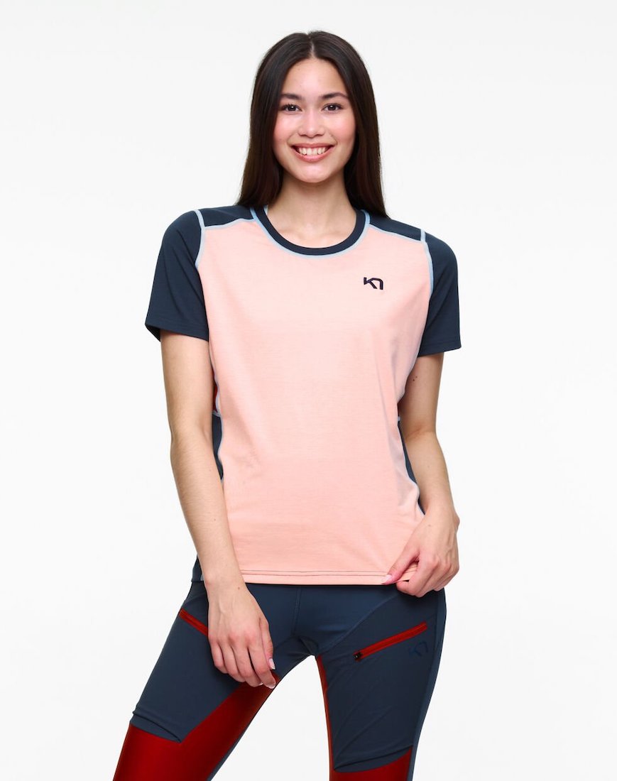 Front view of model wearing multi colored tee shirt by Kari Traa.