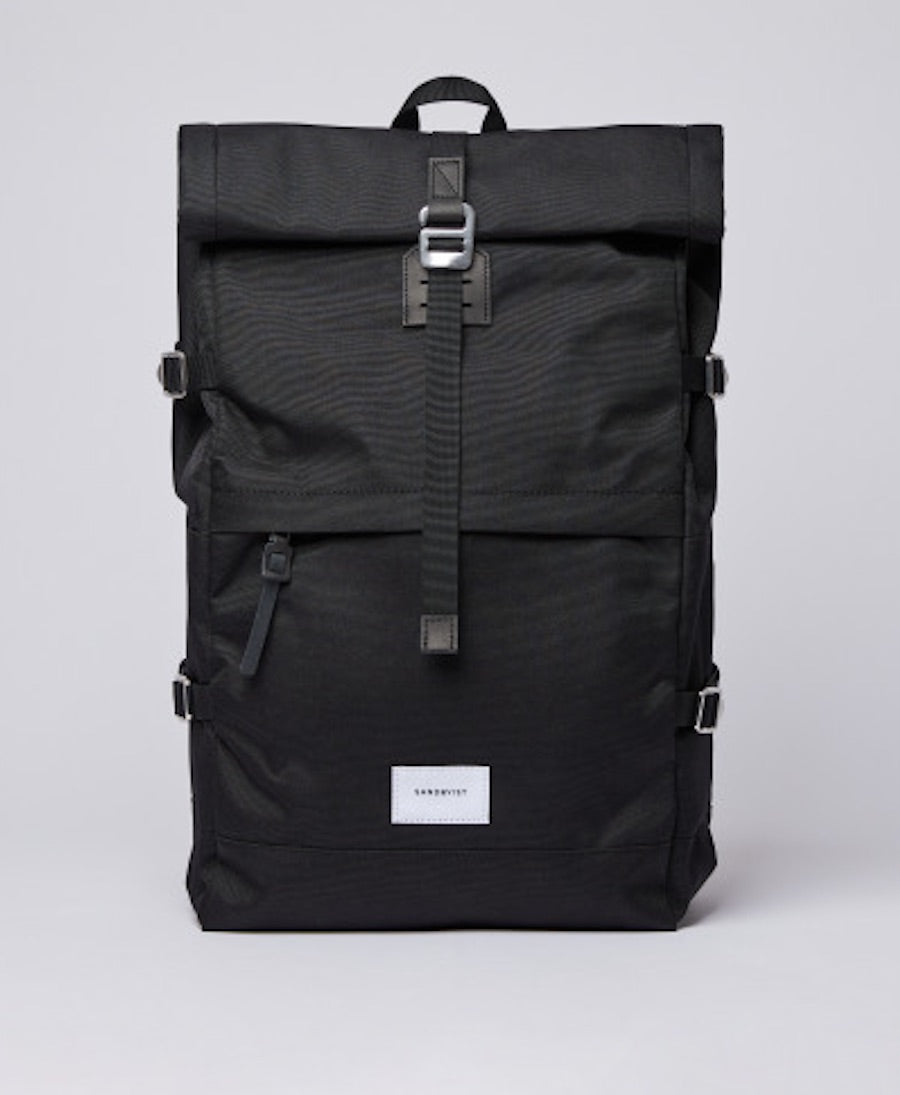 Functional backpack with a rolltop in black.