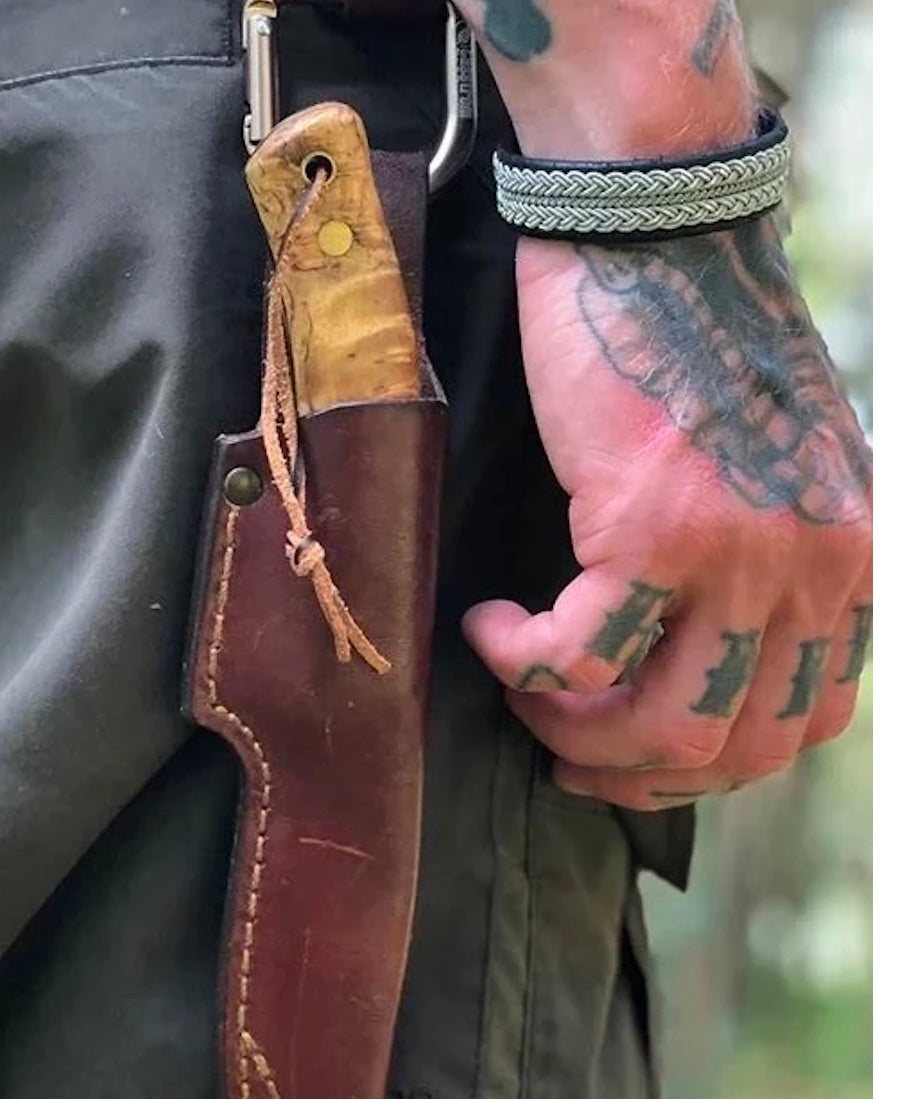 Celina bracelet on man's tattooed wrist
