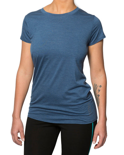 Woman wearing a blue T-shirt.