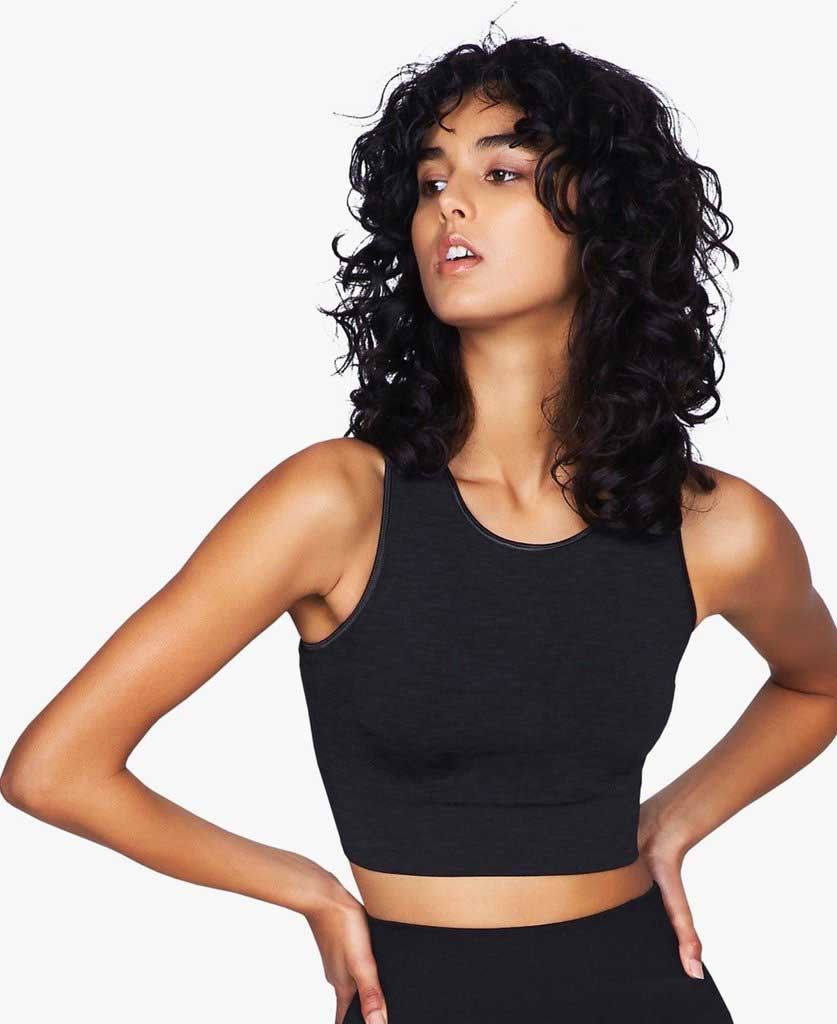 model posing in seamless crop top by moonchild yoga wear for aktiv scandinavian athleisure