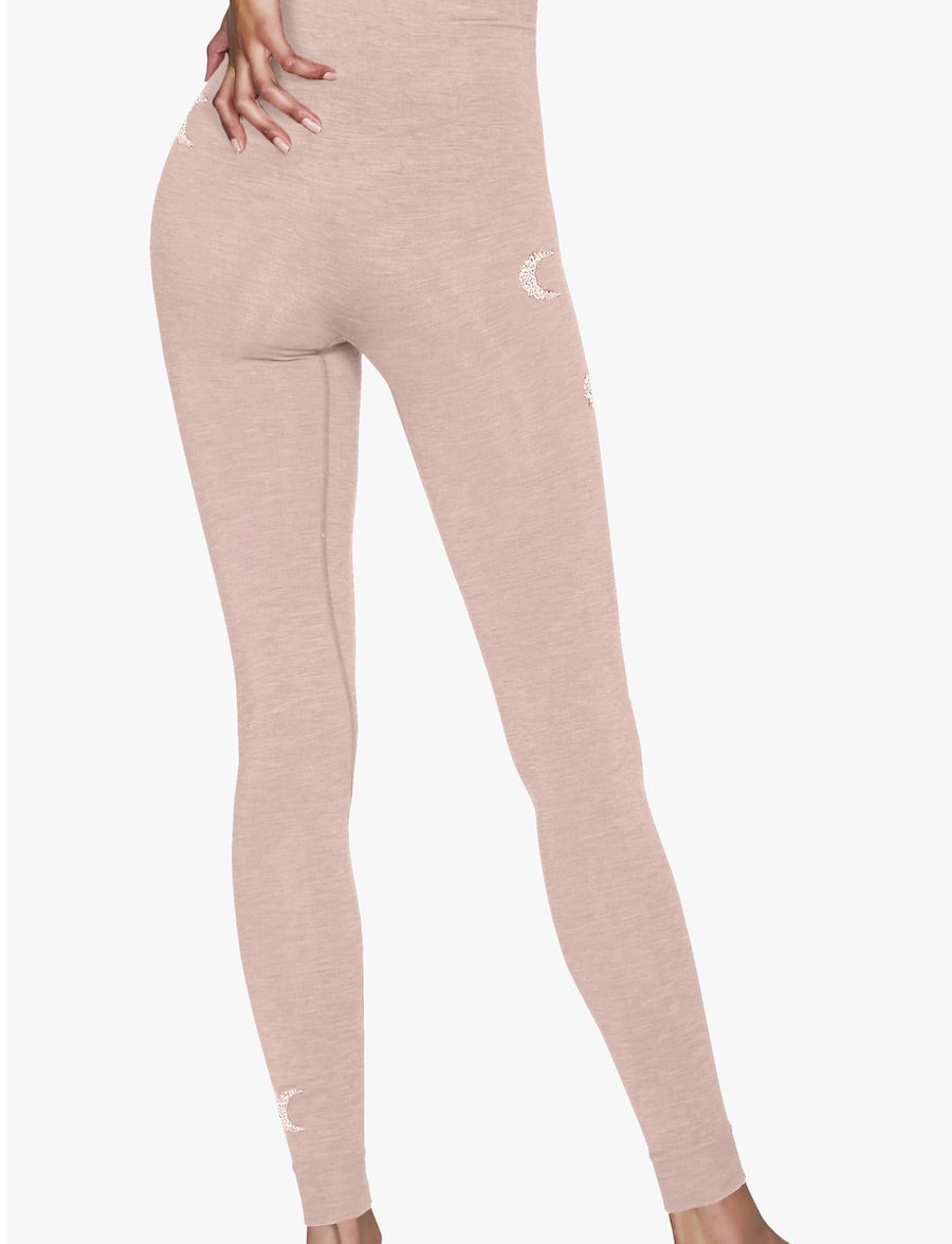 Solstice Seamless Legging with silver crescent moons in Rose Dust on model back view