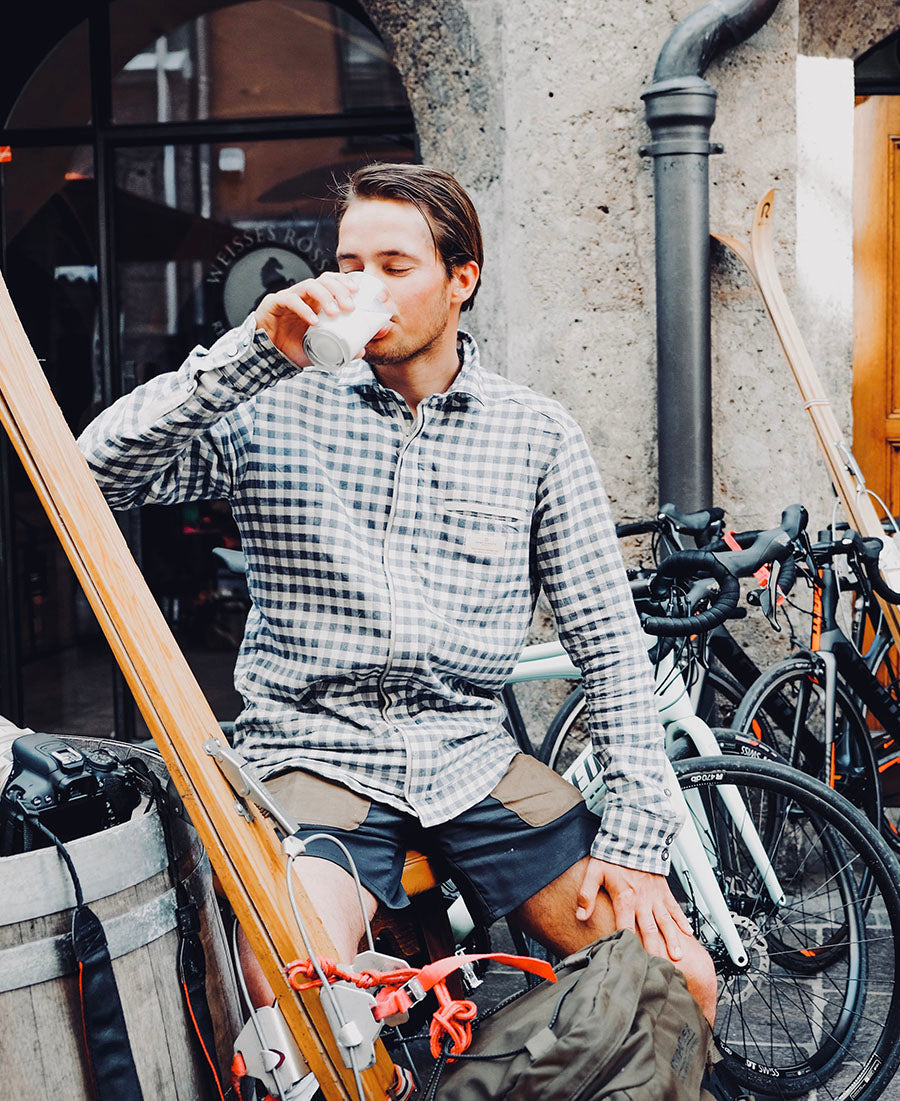 model drinking in vagabond shirt mens amundsen sports for aktiv scandinavian outdoor wear
