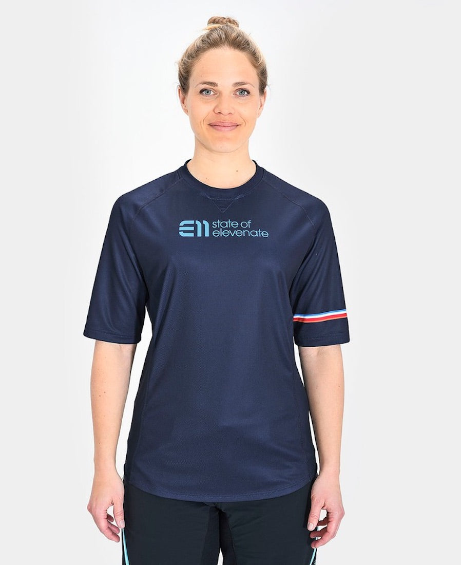 Front view of model wearing Allmountain short sleeve T-shirt in navy.