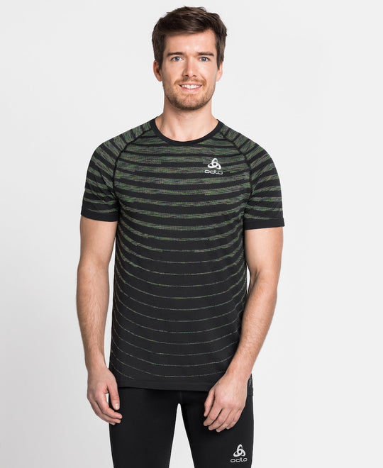 Runner wearing striped shirt by Odlo.