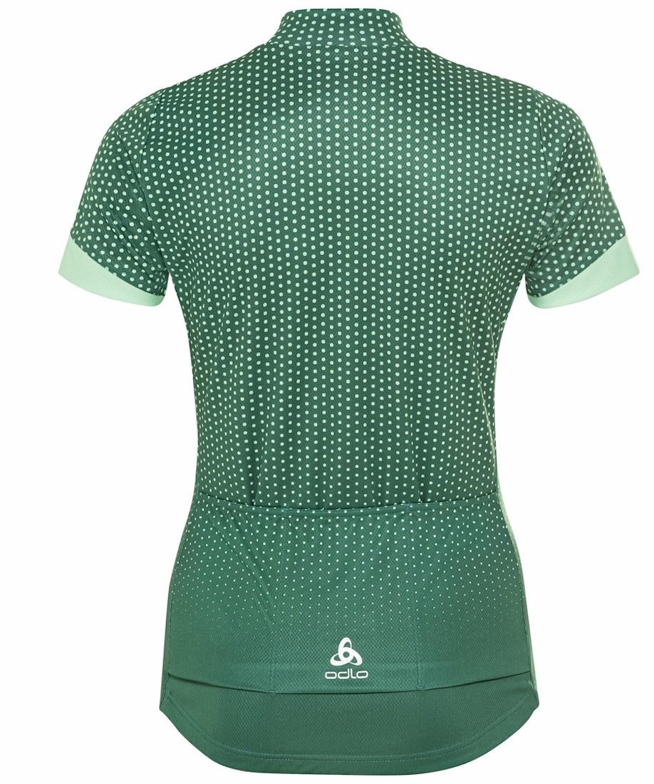 Back view of essential jersey bike shirt in green with light green polka dots.