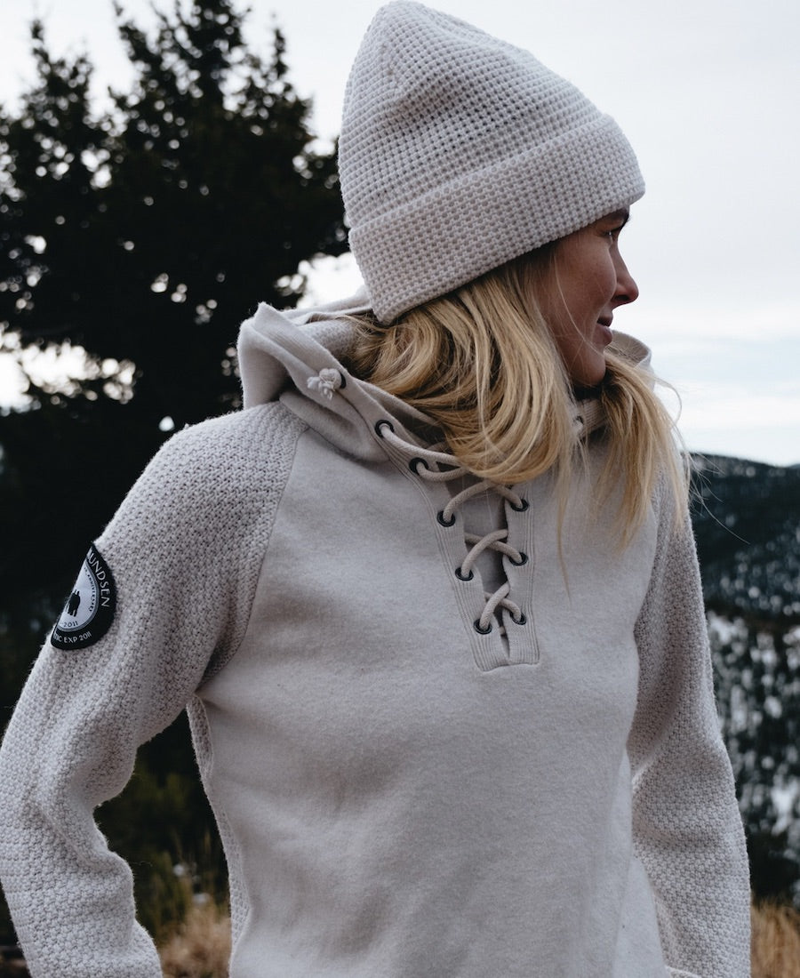 woman wearing amundsen boiled hoodie laced outdoors