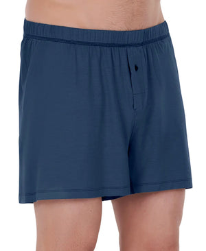 Front view of model wearing stay cool sleep boxers in blue.